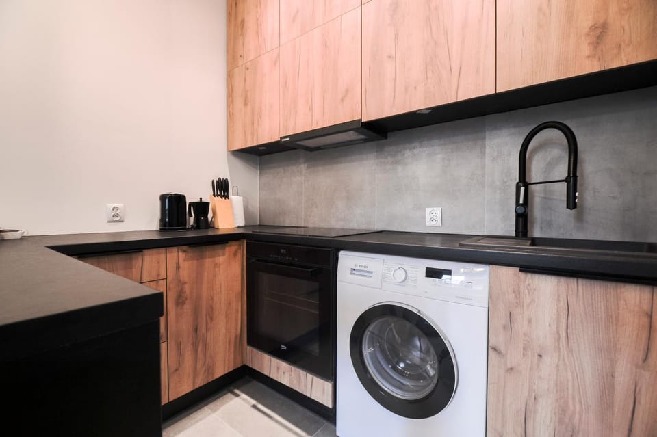 Kitchen or kitchenette, washing machine