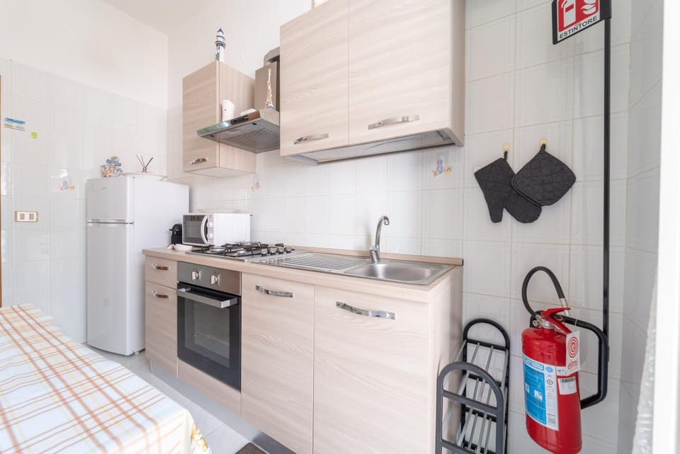 Kitchen or kitchenette, oven, stove