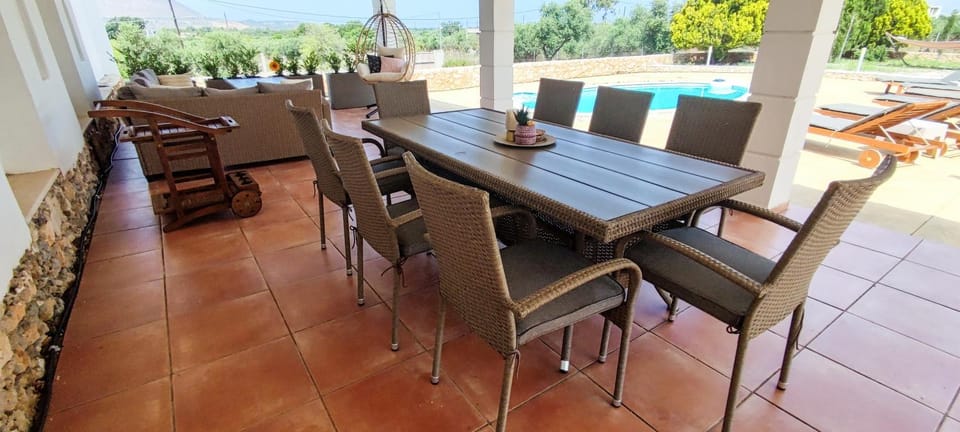 Patio, Seating area, Dining area, Pool view, sunbed