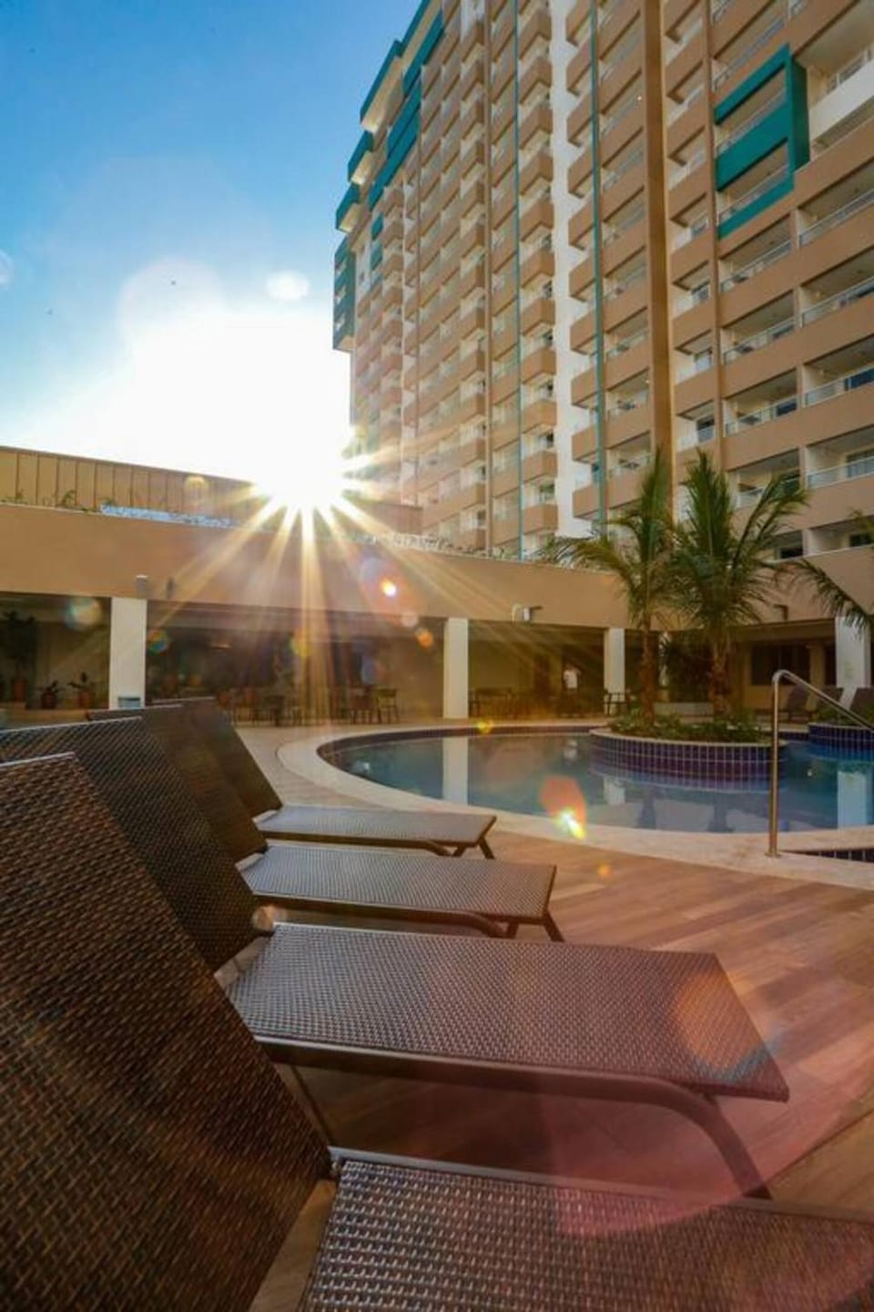 Property building, Patio, Day, View (from property/room), Balcony/Terrace, Seating area, Evening entertainment, Pool view, Swimming pool