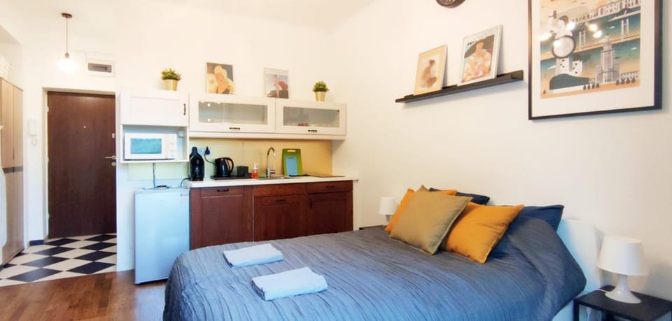 Bed, minibar, kitchen