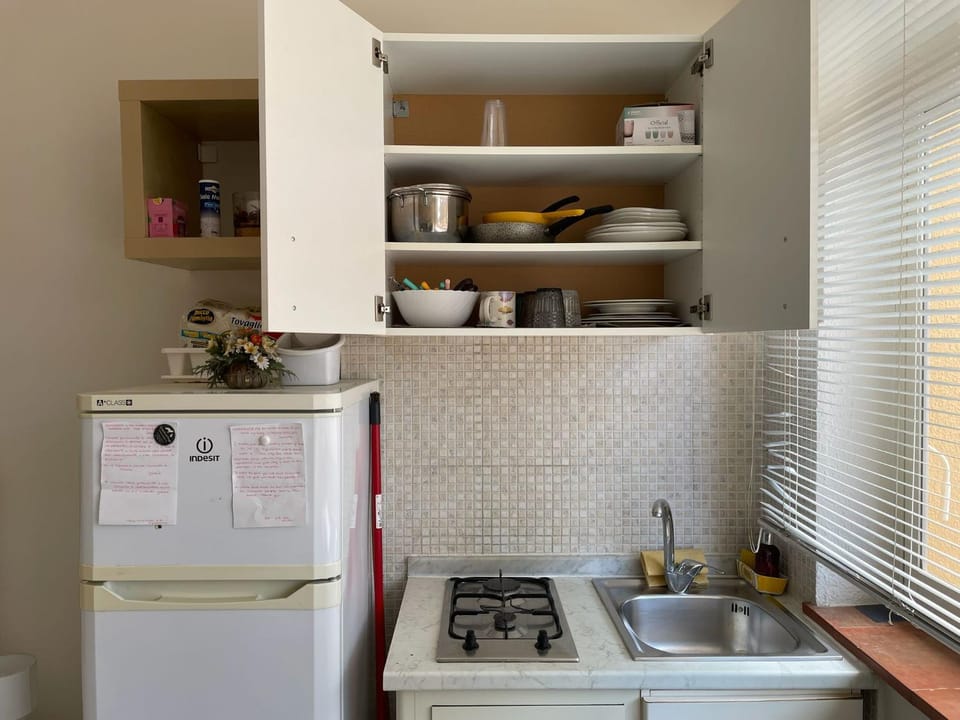 Kitchen or kitchenette, stove, kitchen