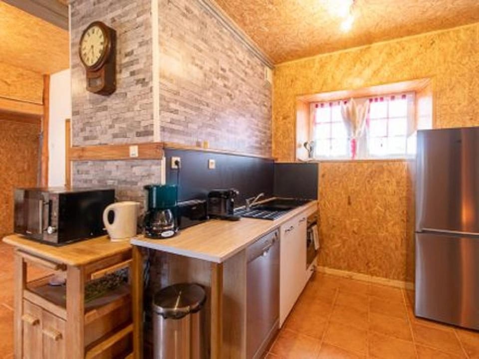 Kitchen or kitchenette, dishwasher, oven, stove, toaster