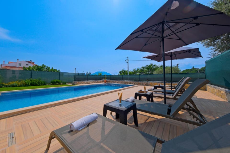 Patio, Pool view, sunbed
