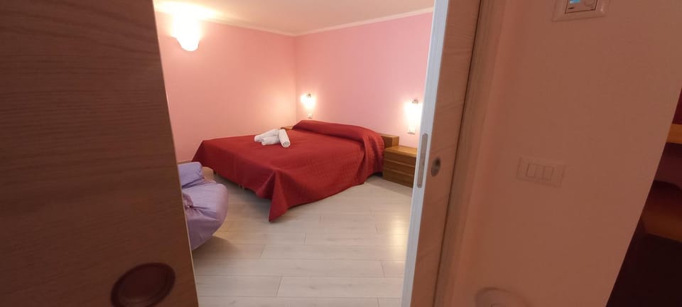 Casa Floriani Fiavè-Comano Terme pink House in Trentino-South Tyrol