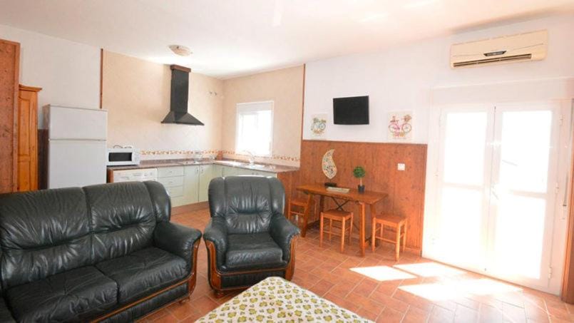 Kitchen or kitchenette, Seating area, Dining area, air conditioner