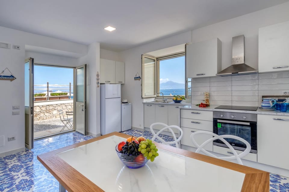 Kitchen or kitchenette, Living room, Dining area, Sea view