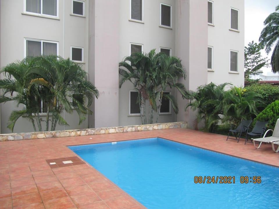 Property building, Day, Pool view, Swimming pool