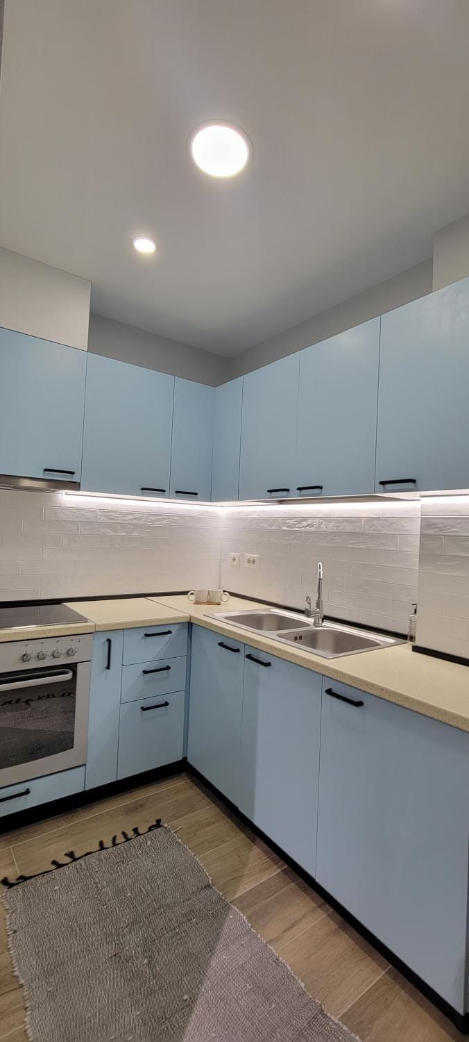 Kitchen or kitchenette, oven, stove