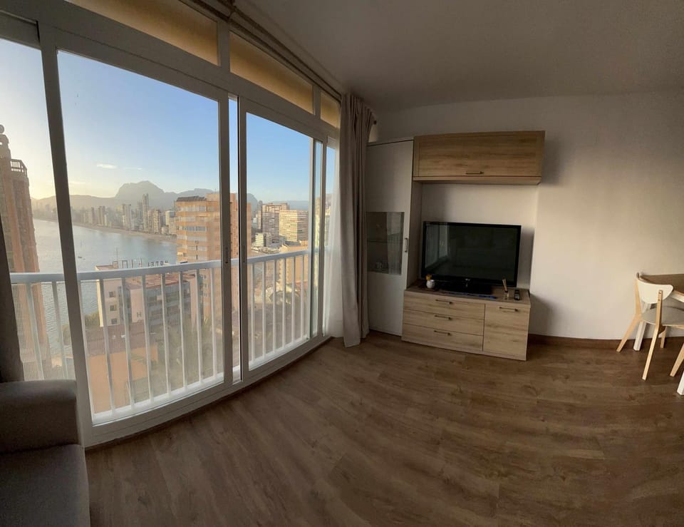 Communal lounge/ TV room, TV and multimedia, View (from property/room), Beach, Mountain view