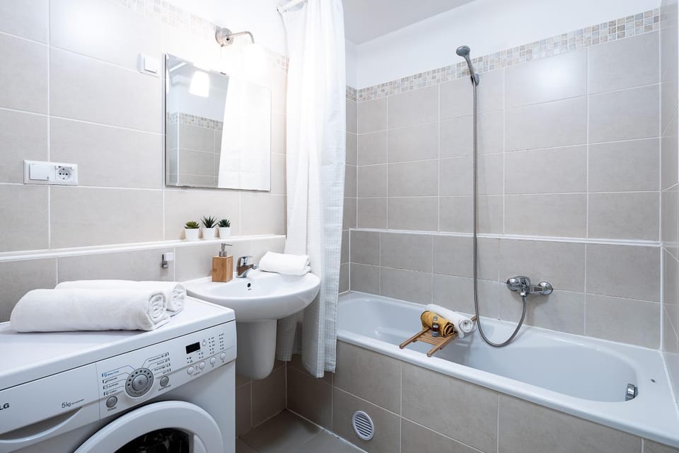 Bathroom, hair dryier, towels