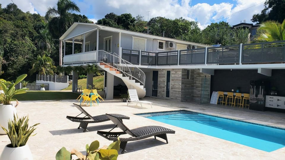 Property building, Patio, Garden, View (from property/room), Balcony/Terrace, Garden view, Pool view, Swimming pool, sunbed