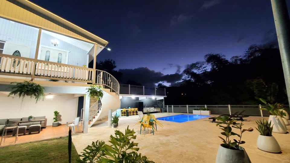 Property building, Patio, Night, Garden, View (from property/room), Balcony/Terrace, Garden view, Pool view, Swimming pool