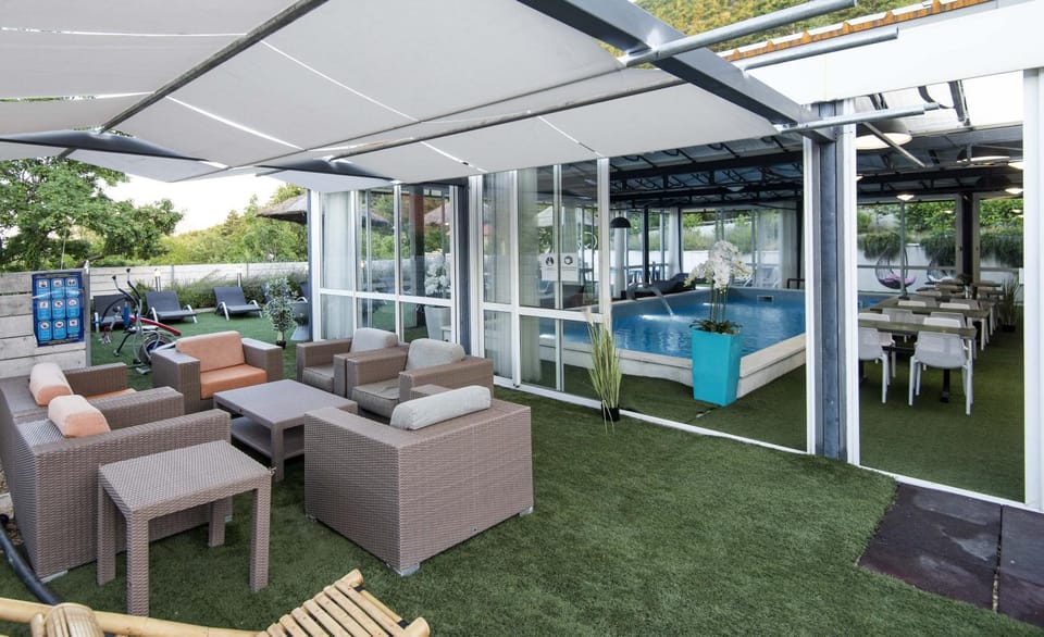 Patio, Day, Seating area, Pool view, Swimming pool, sunbed