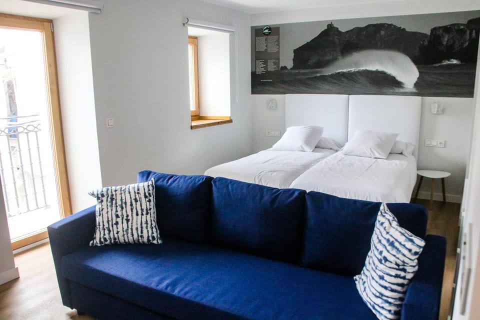 Bed, Living room, Seating area, Bedroom