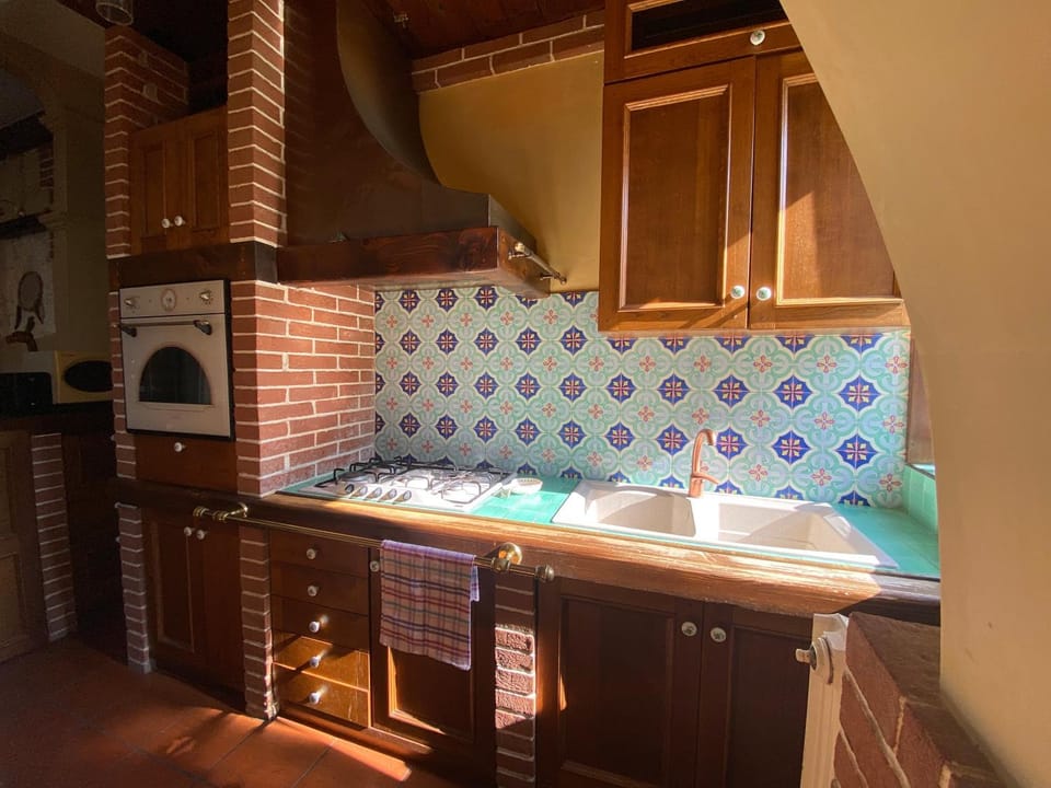 Kitchen or kitchenette, stove, kitchen