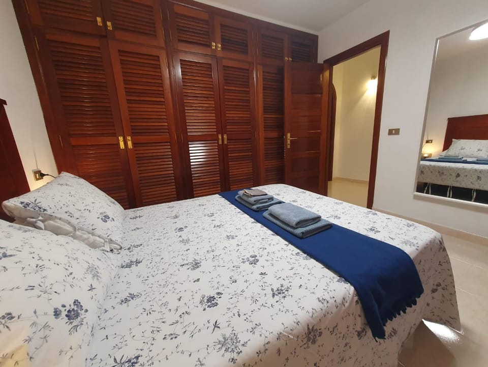 Bed, wardrobe