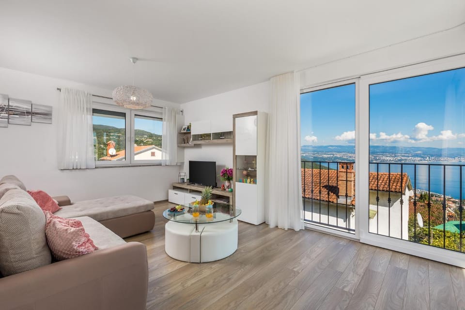 TV and multimedia, View (from property/room), Living room, Seating area, Sea view