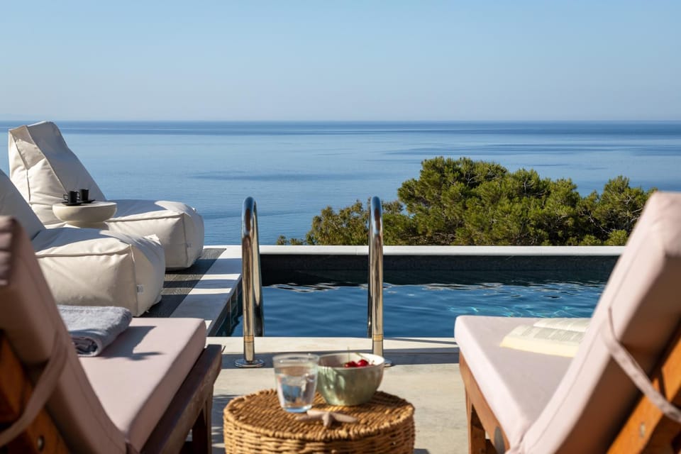 View (from property/room), Seating area, Pool view, Sea view, Swimming pool, sunbed