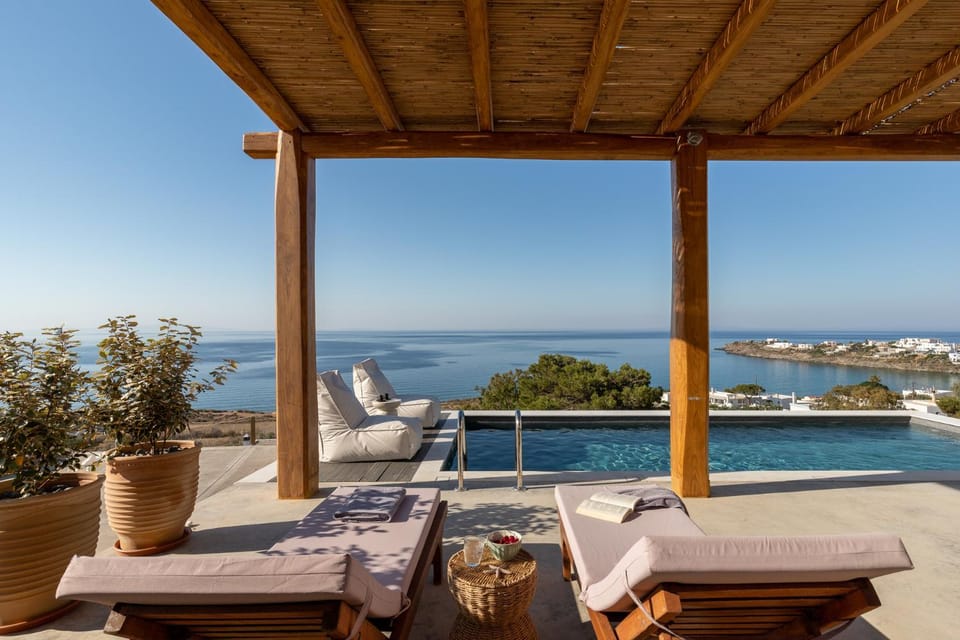 View (from property/room), Seating area, Sea view, Swimming pool