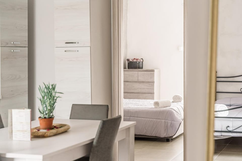 Bed, Photo of the whole room, Bedroom, hair dresser, towels