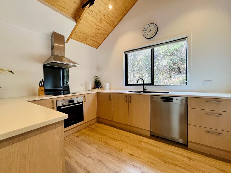 Kitchen or kitchenette, dishwasher, oven, stove, toaster, kitchen