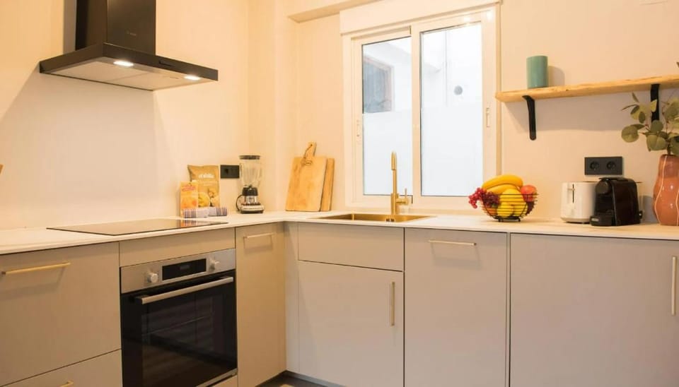 Kitchen or kitchenette, dishwasher, oven, stove, toaster, kitchen