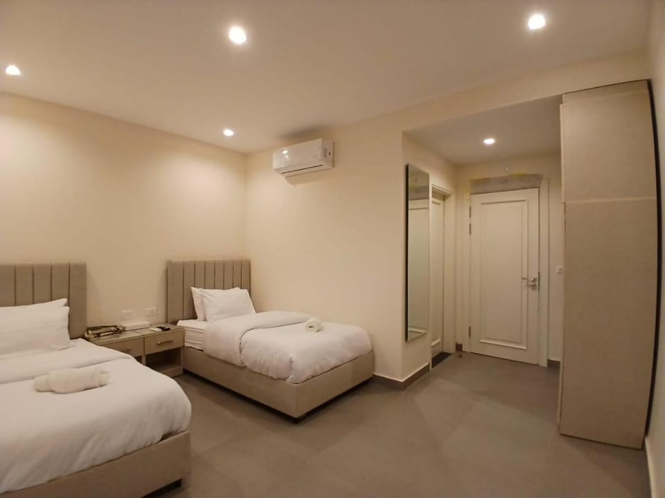 Photo of the whole room, Bedroom, towels, wardrobe