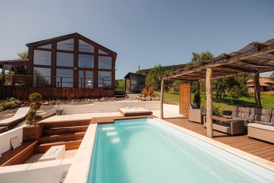 Le Chalet M - Refugiu montan cu piscina & ciubar Chalet in Romania