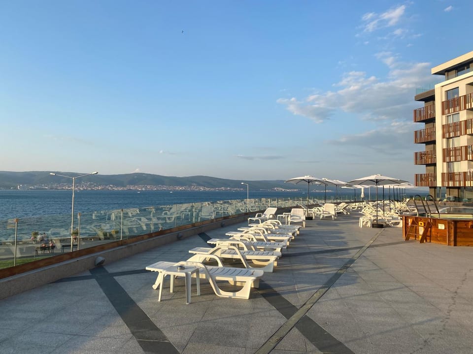 Property building, Seating area, Mountain view, Sea view, Swimming pool, Seasons, Sunset