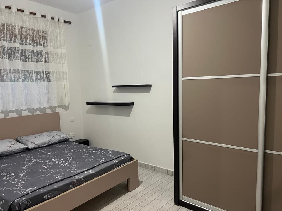 Bed, wardrobe