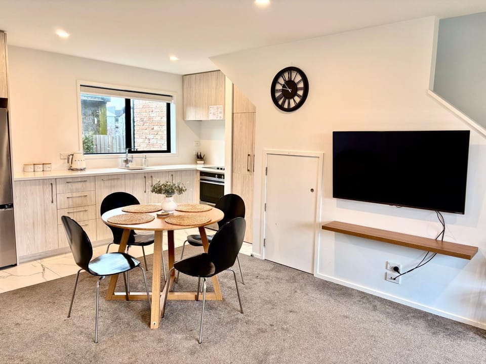 Cosy Townhouse Close to Wolfbook Arena One KM Away From Railway Station With Rare Onsite EV Car Park Apartment in Christchurch