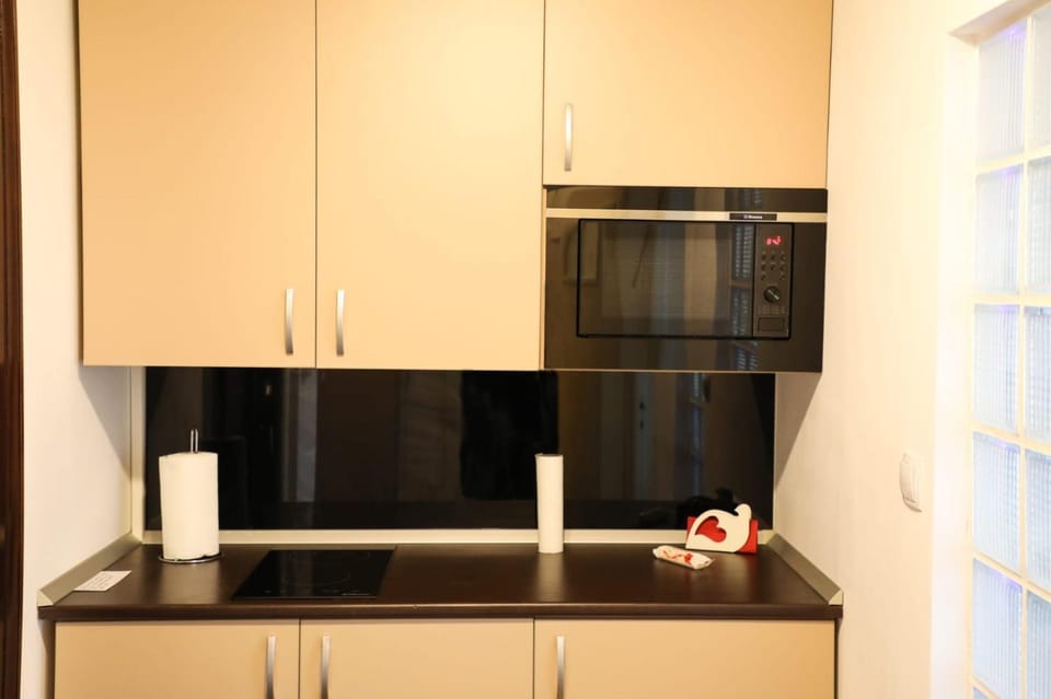Kitchen or kitchenette, stove