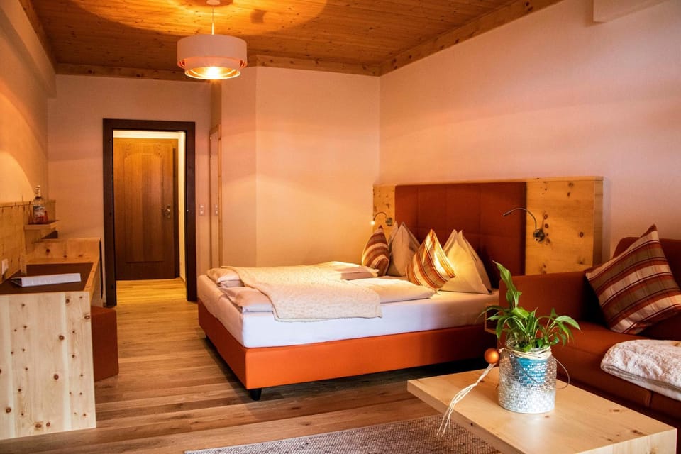 Bed, Living room, Seating area, Bedroom
