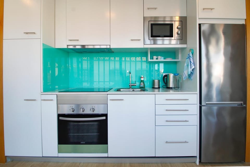 Kitchen or kitchenette, oven, stove