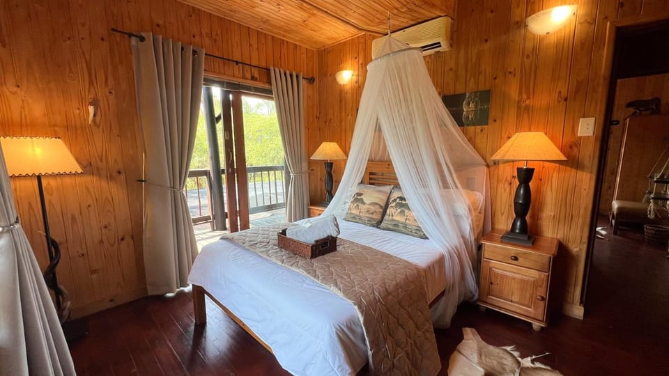 Bed, Photo of the whole room, Bedroom, towels, air conditioner