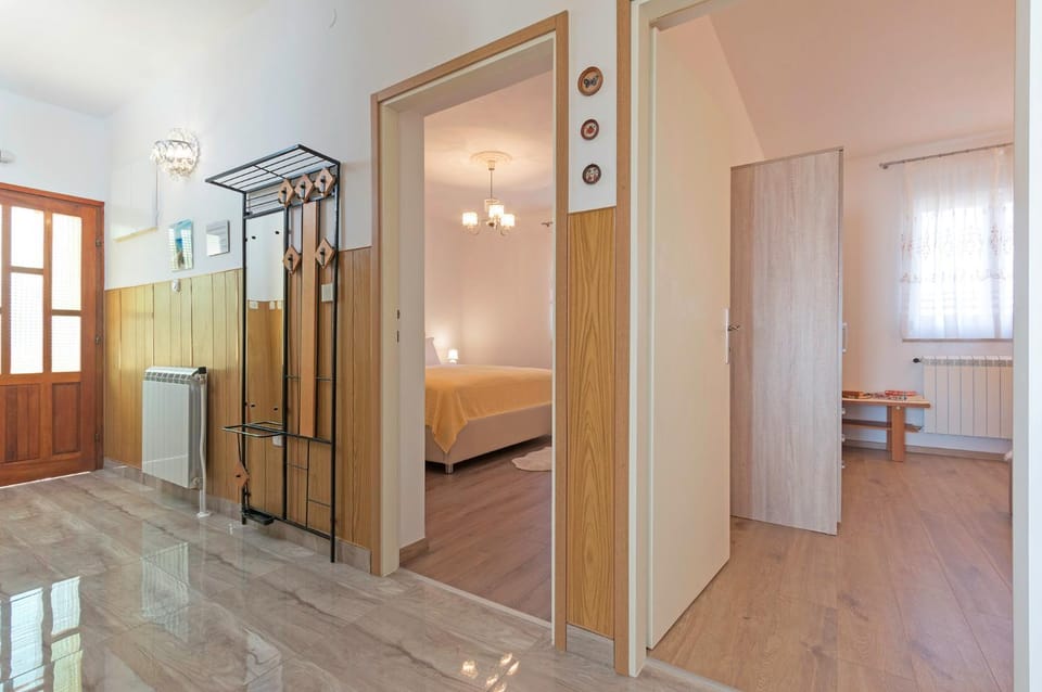 View (from property/room), flat iron, heating, safe, wardrobe