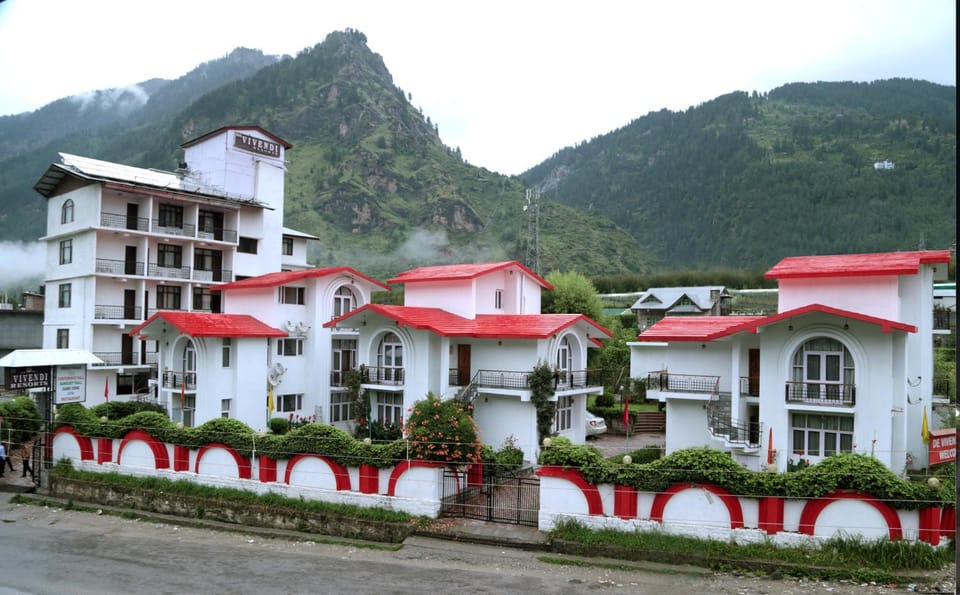 Property building, Facade/entrance, Day, City view, Mountain view