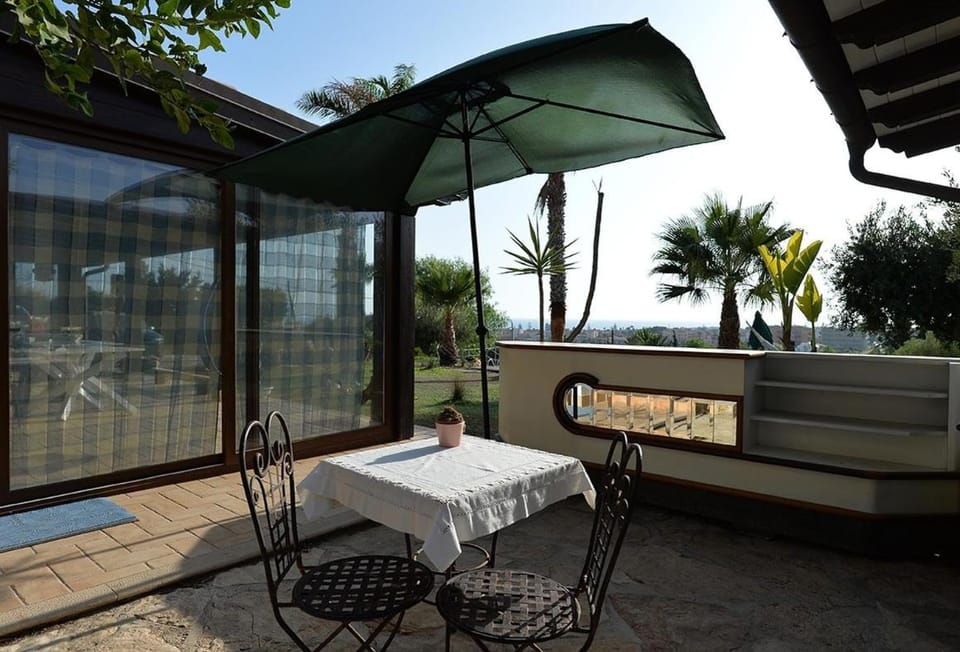 Patio, Day, Natural landscape, View (from property/room), Seating area, Dining area, Sea view, Sunset