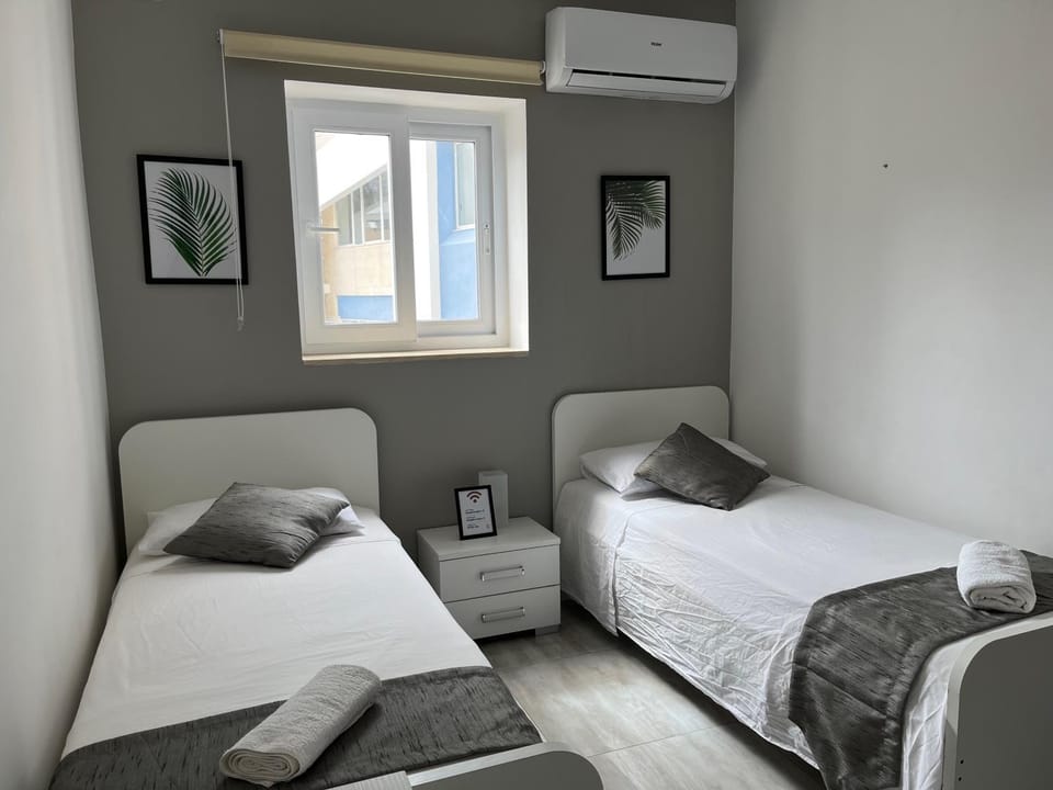 Bedroom, towels, air conditioner
