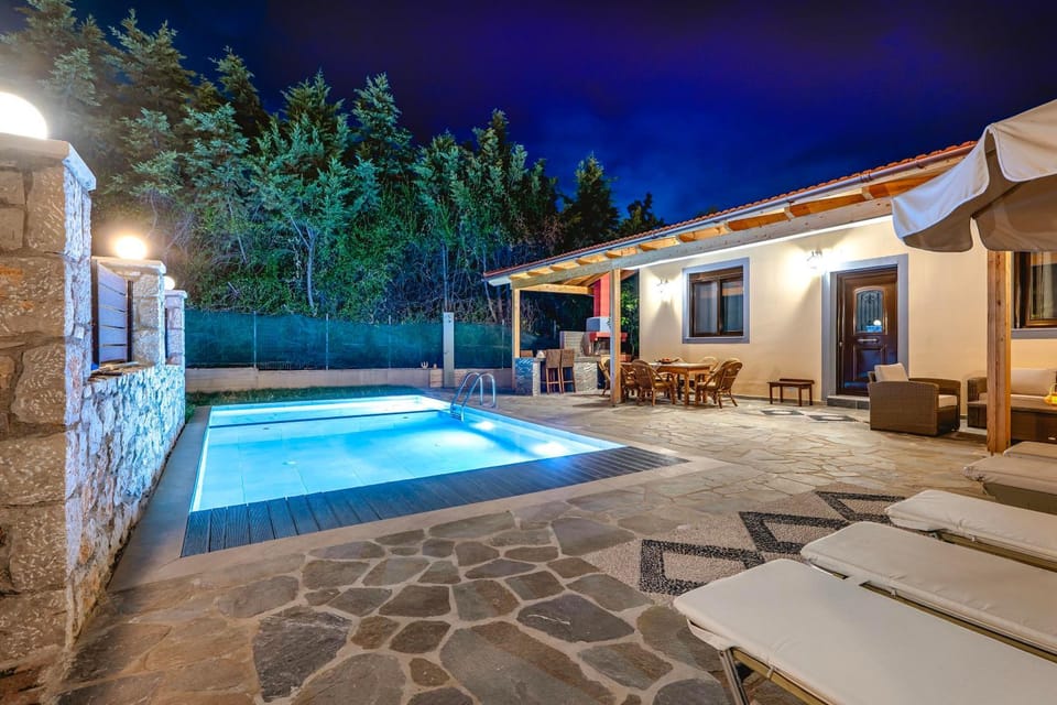Property building, Patio, Night, Natural landscape, Pool view, Swimming pool, sunbed