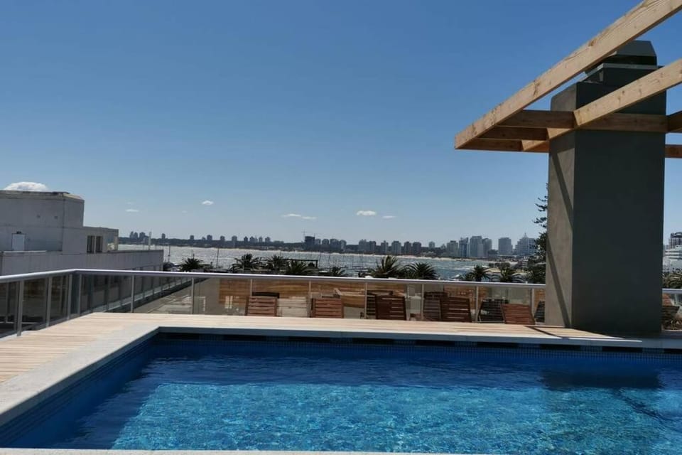 View (from property/room), Balcony/Terrace, Pool view, Swimming pool