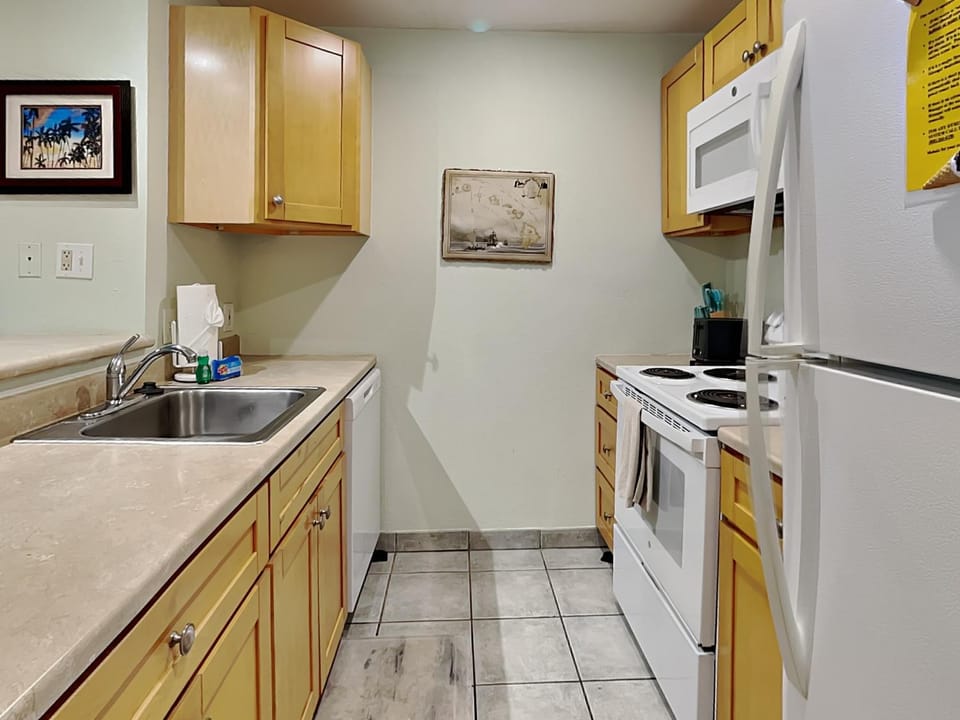 Kitchen or kitchenette, furniture, microwave, stove, kitchen