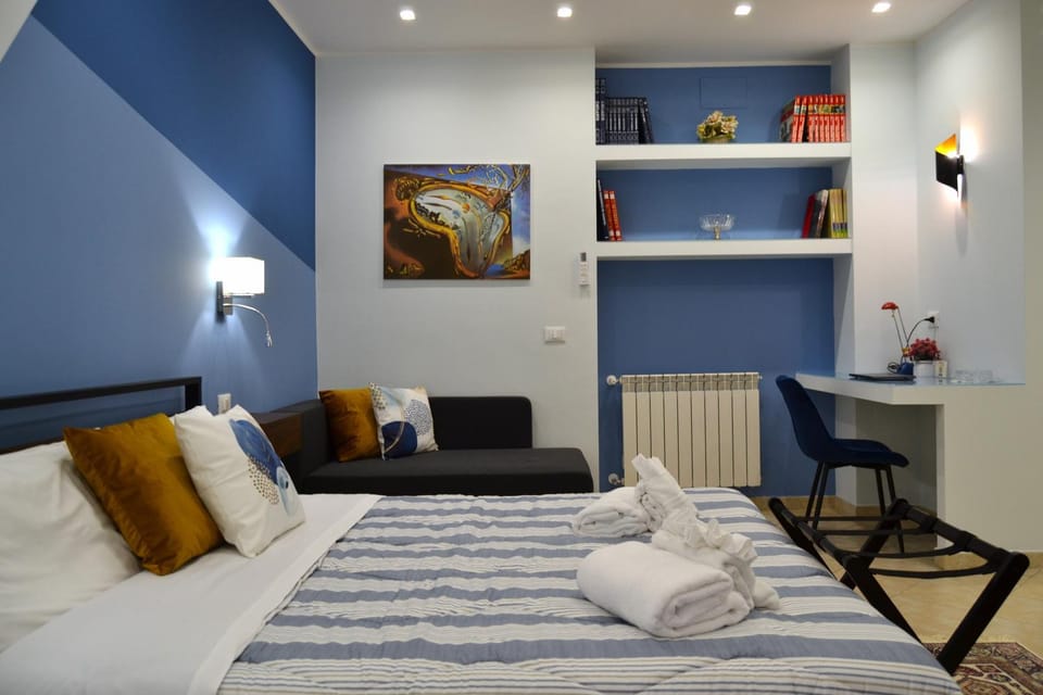 Bed, Living room, Seating area, Bedroom