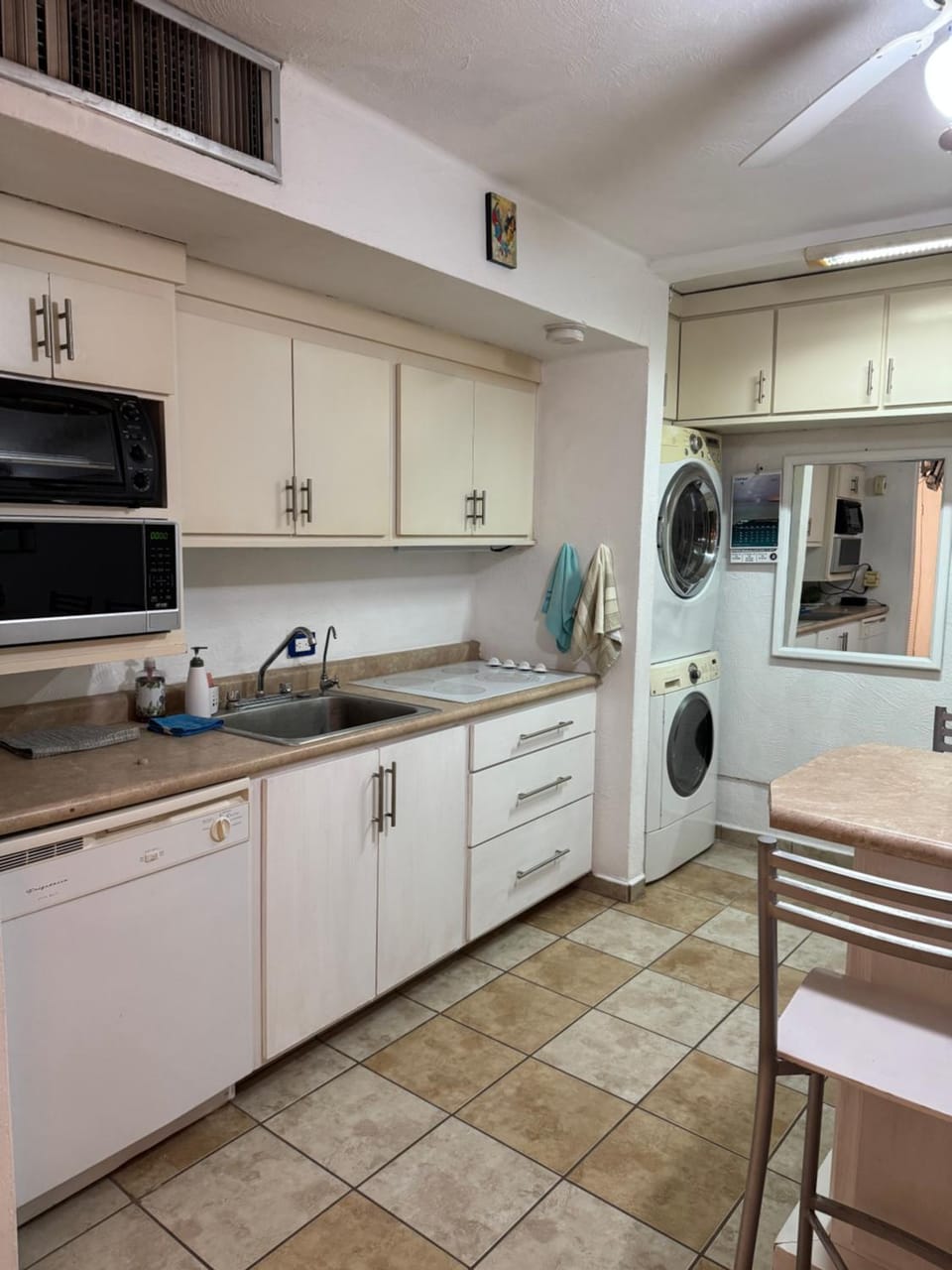 Kitchen or kitchenette, dishwasher, washing machine, dryer