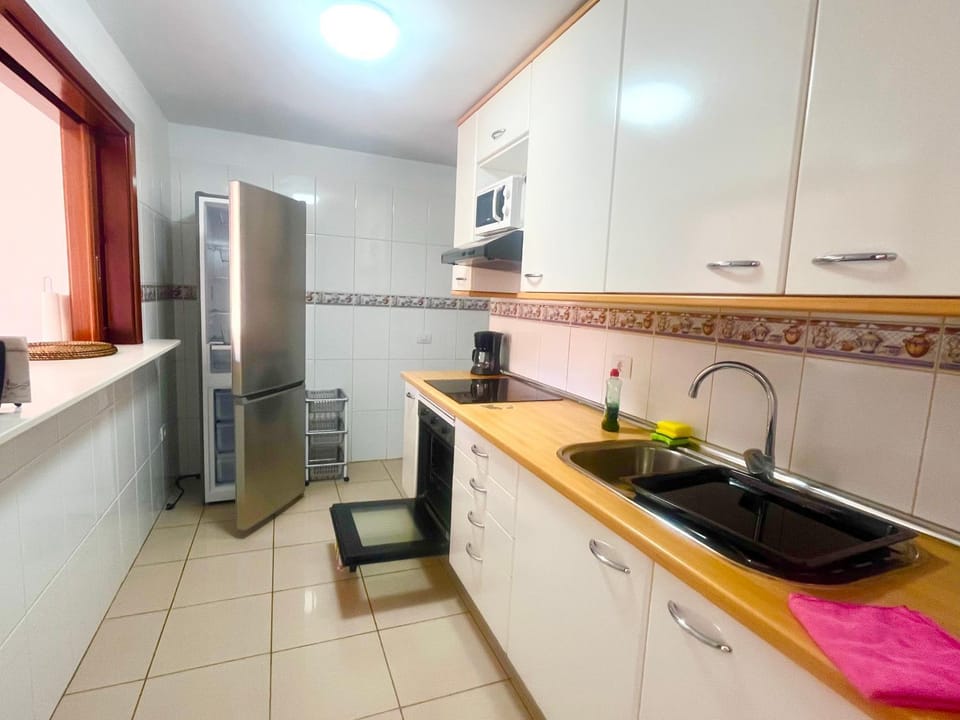 Kitchen or kitchenette, oven, stove, toaster