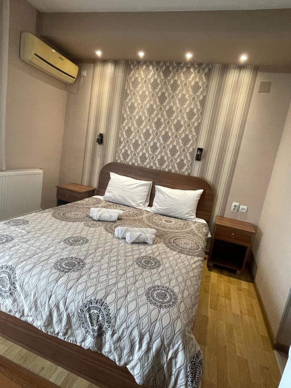 Bed, Photo of the whole room, Bedroom, towels, air conditioner