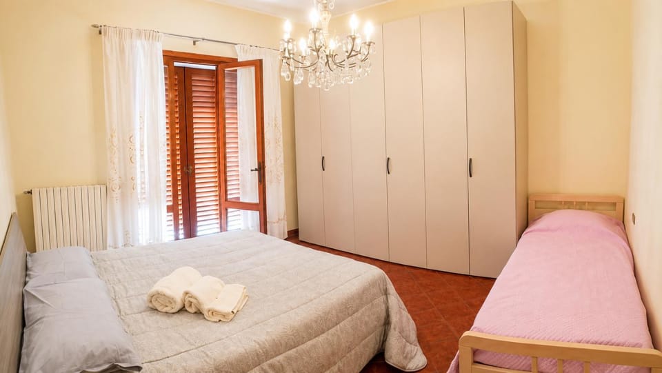 Bed, Photo of the whole room, Bedroom, towels, wardrobe