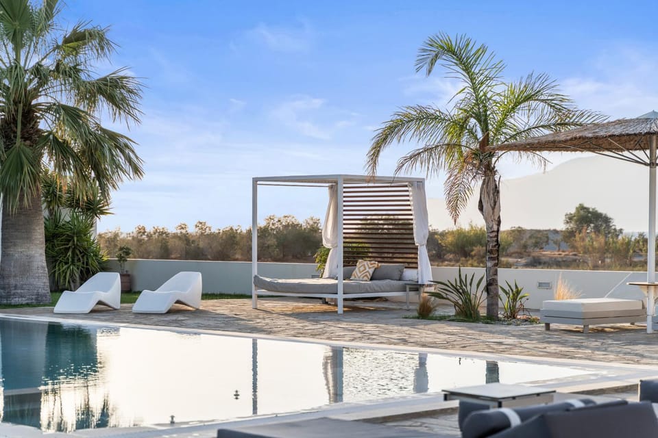 Patio, Day, Natural landscape, Pool view, Swimming pool, sunbed