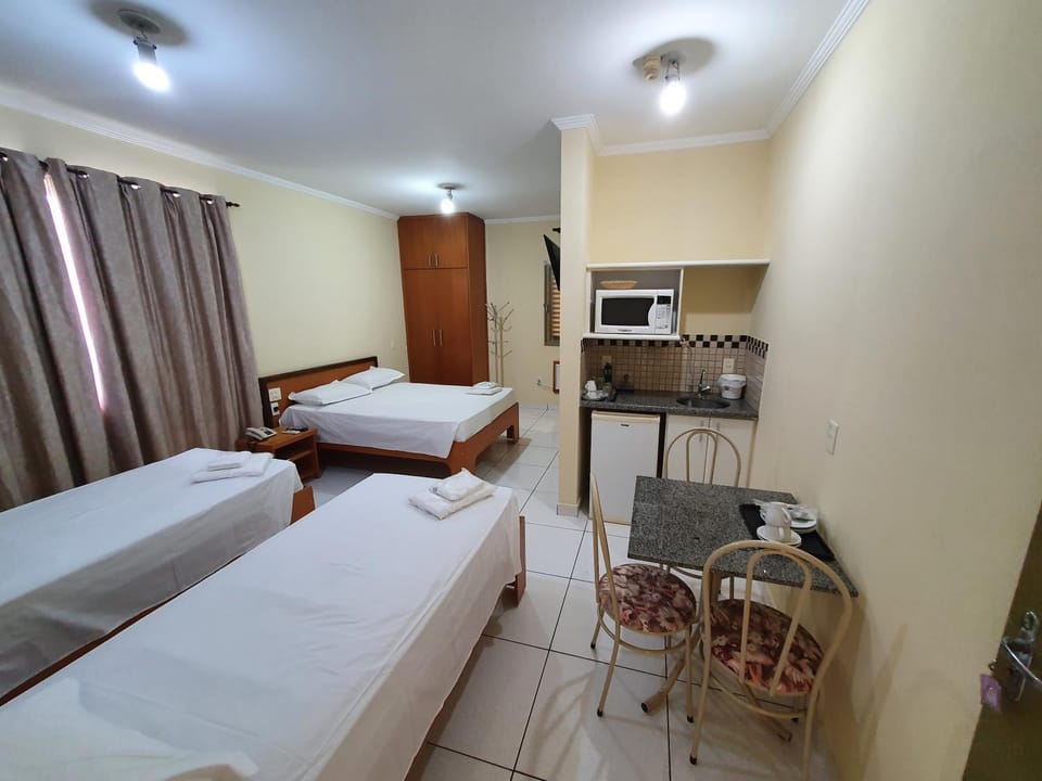 Bed, Kitchen or kitchenette, minibar